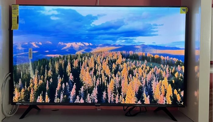 TV turned on showing colorful user interface